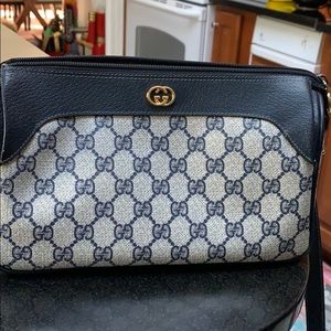 Blue Gucci crossbody bag with dust bag